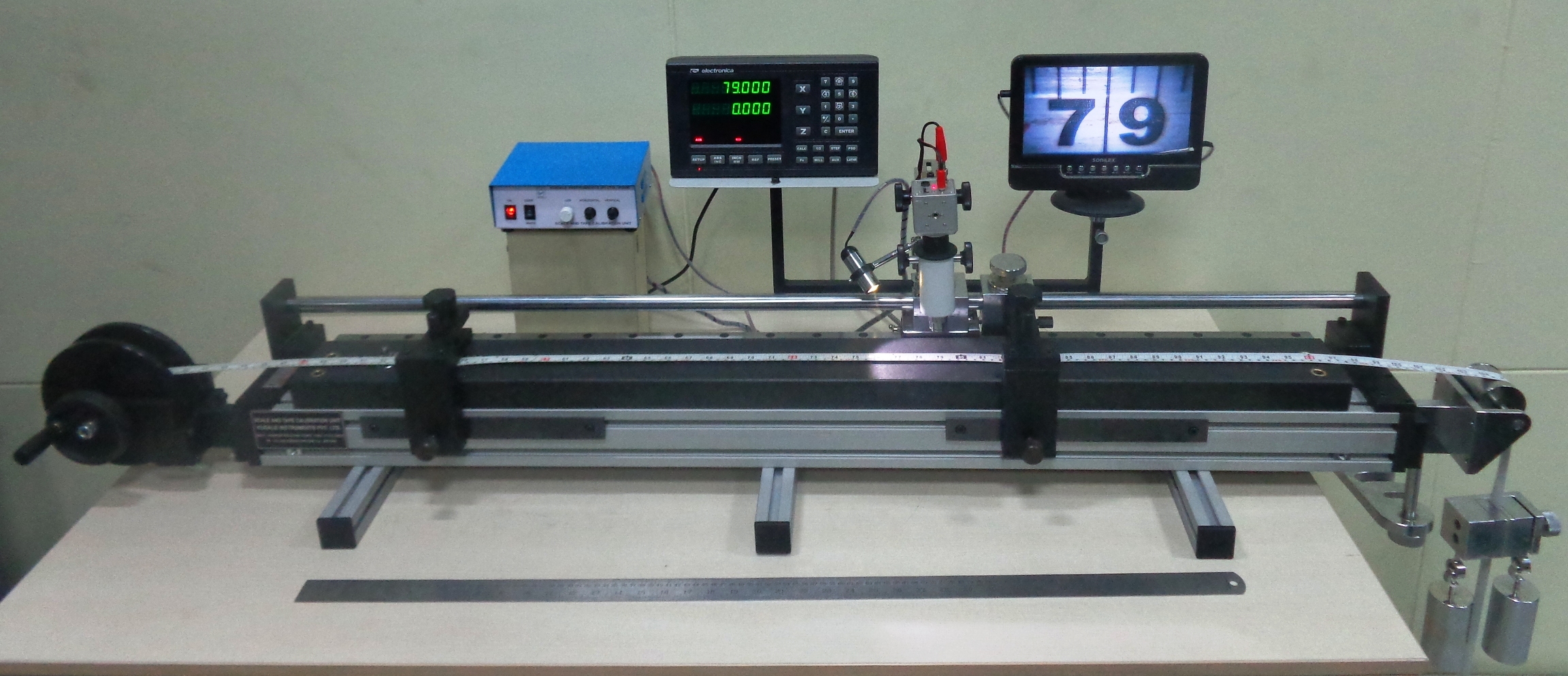 Scale And Tape Calibration Unit